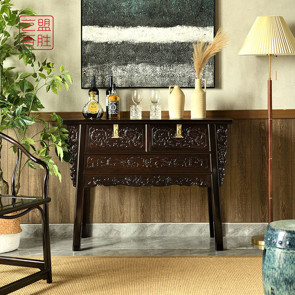 A two-drawer sideboard cabinet with phoenix carvings, made from African blackwood 紫光檀螭凤纹联二橱