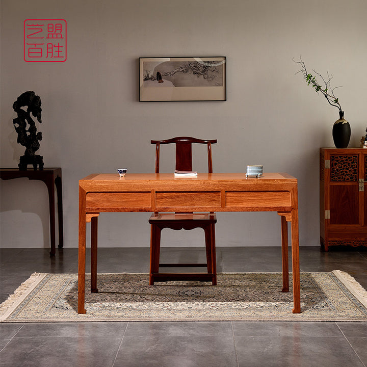 Traditional wooden desk with three drawers in Pterocarpus macrocarpus.