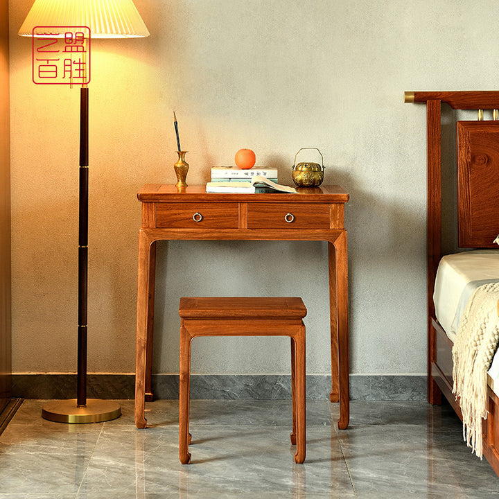 Beautifully crafted rosewood dressing table with a matching stool.