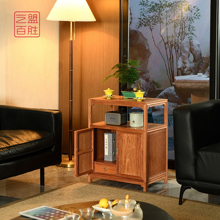 Minimalist wooden cabinet for tea and water storage.