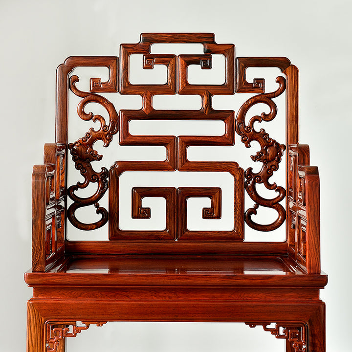 Granadillo wood chair with intricate carvings