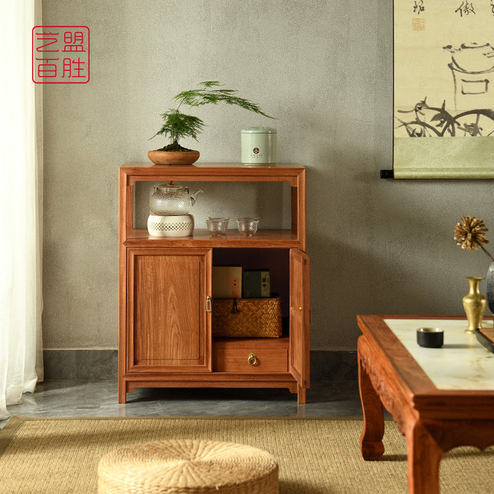 Open shelf Pterocarpus Macrocarpus cabinet with double doors.