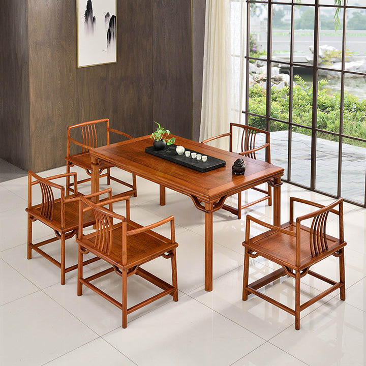 Handcrafted Pterocarpus macrocarpus dining table and chair set in a minimalist design.