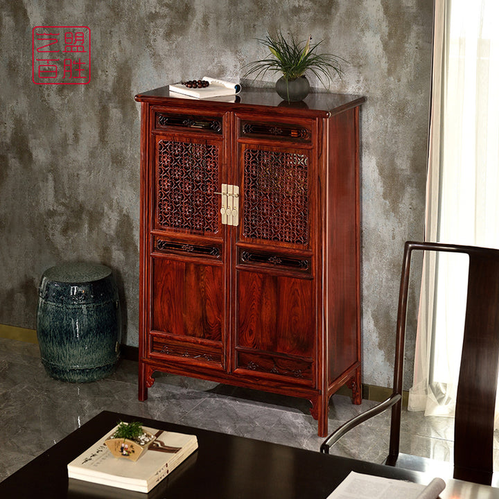 Elegant Granadillo wood cabinet featuring cloud designs