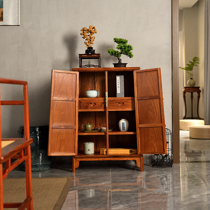 Beautifully crafted rosewood cabinet featuring a classic design.