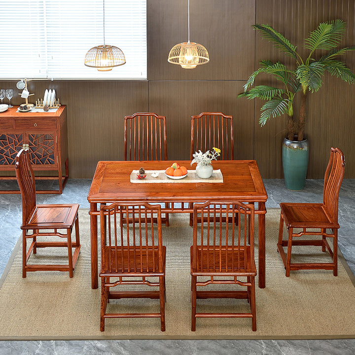 Exquisite Pterocarpus macrocarpus dining table and chairs with traditional Chinese elements.