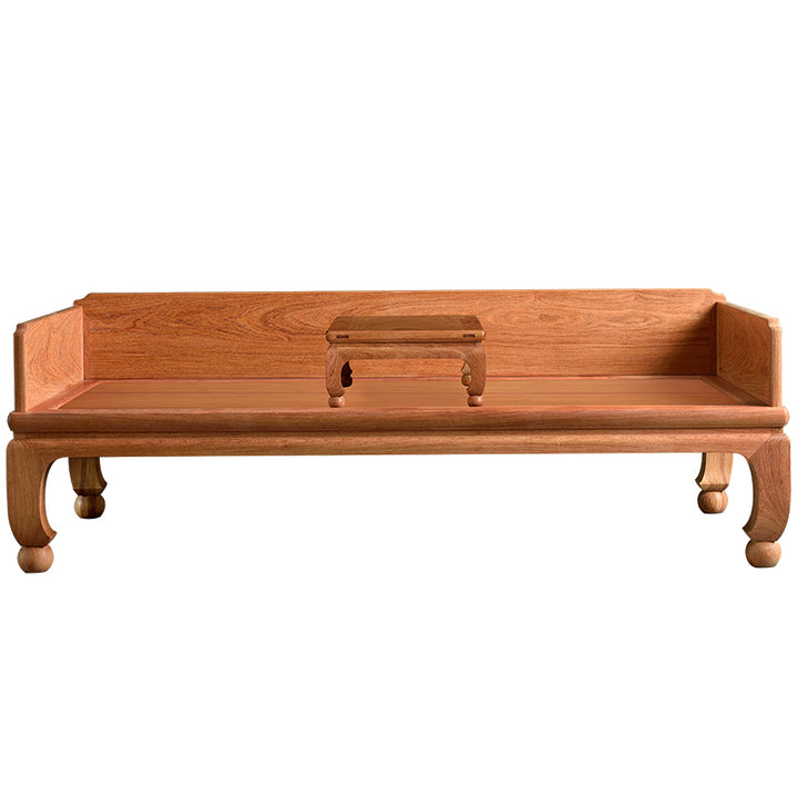 Wooden sofa bed featuring a minimalist design with rounded ball feet and a small tea table.