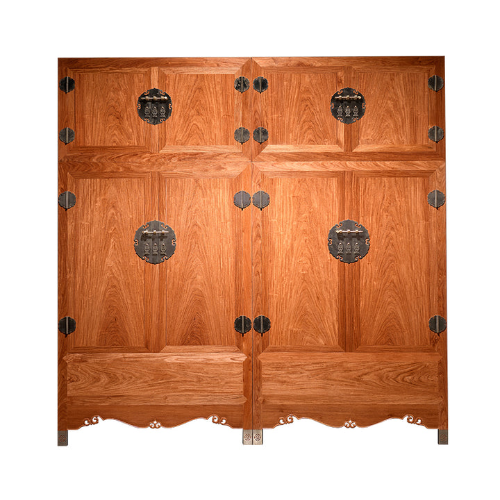 A large wooden cabinet made from Pterocarpus macrocarpus with a rolling cloud top design.