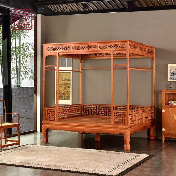 Palace-style wooden bed with intricate carvings and lattice design.