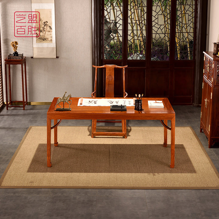 A large rosewood rectangular painting table with straight legs.