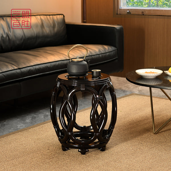 A vine-patterned round stool made from African blackwood 紫光檀仿藤条鼓凳