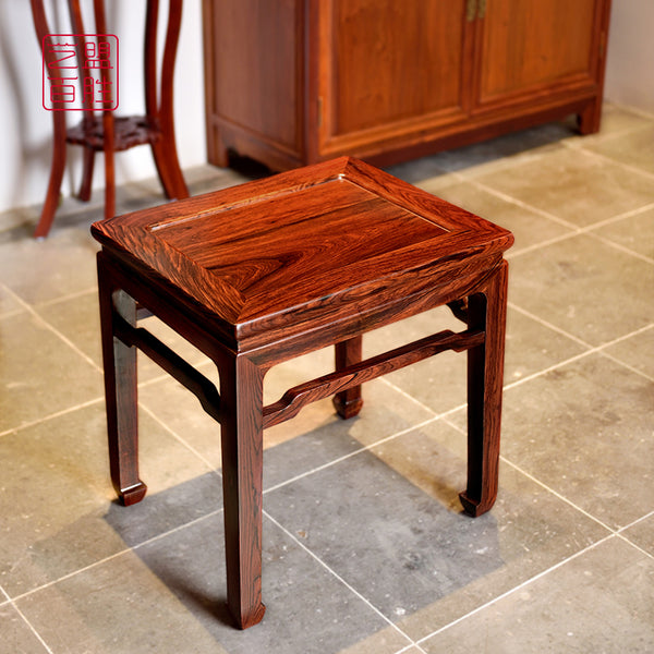 Granadillo small square stool with elegant design