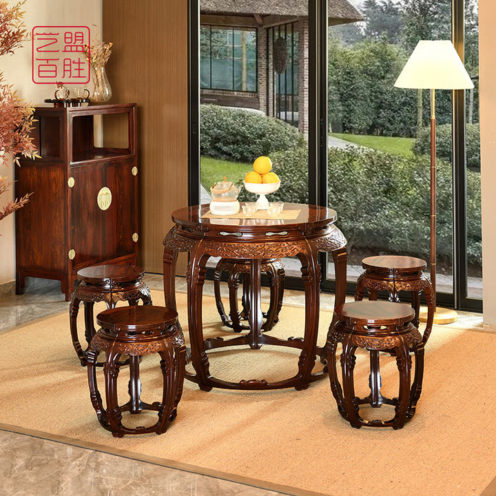 Handcrafted rosewood round table with five curved legs and a concave surface