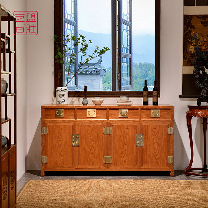 Dining room sideboard crafted from Pterocarpus macrocarpus with four drawers.