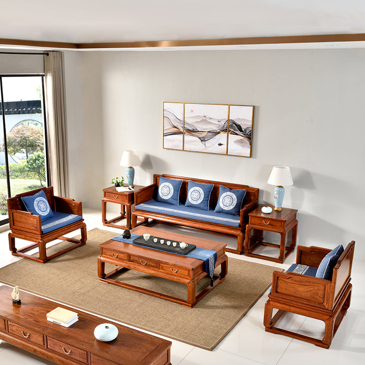 Elegant rosewood furniture set featuring a three-seater sofa, two single chairs, and a coffee table.