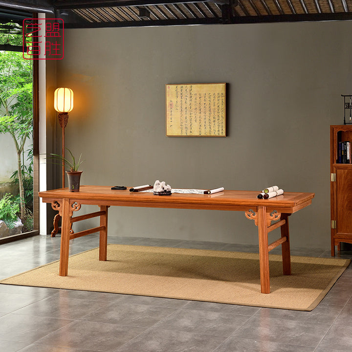 Elegant wooden desk with intricate Ruyi carvings