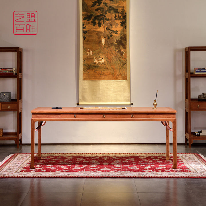 Handcrafted Pterocarpus Macrocarpus desk with six drawers.