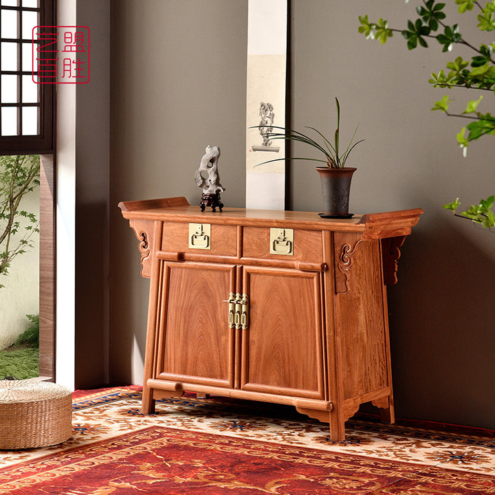 Elegant two-drawer sideboard in Pterocarpus macrocarpus wood.