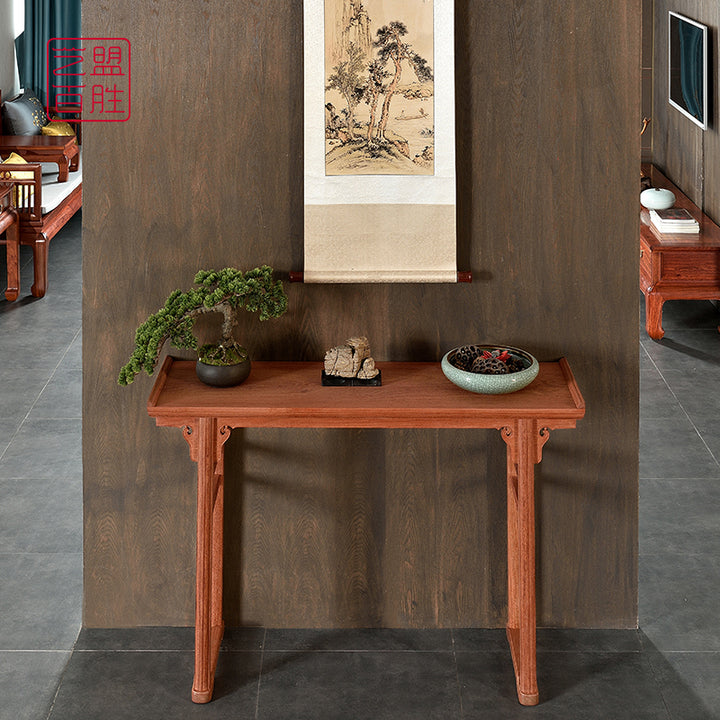 Classic Pterocarpus macrocarpus console table with elegant decor.