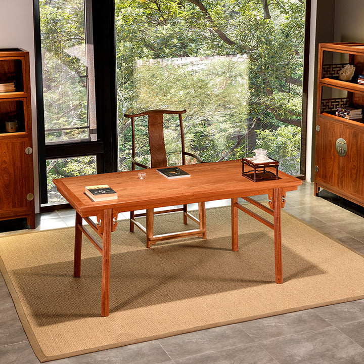 Elegant Pterocarpus macrocarpus desk with a chair and scroll