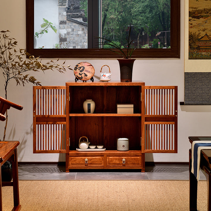 Handcrafted Pterocarpus macrocarpus tea cabinet with metal accents