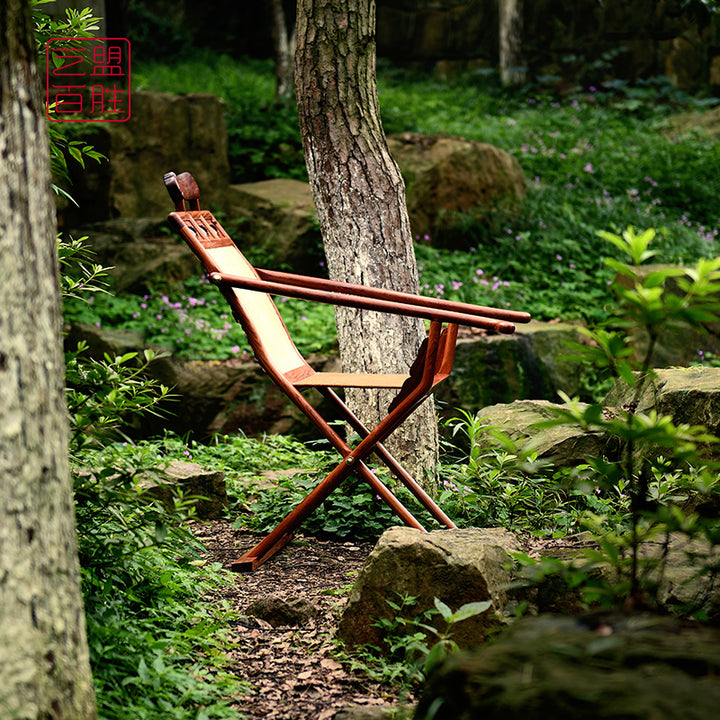 Handcrafted Pterocarpus macrocarpus folding chair with armrests