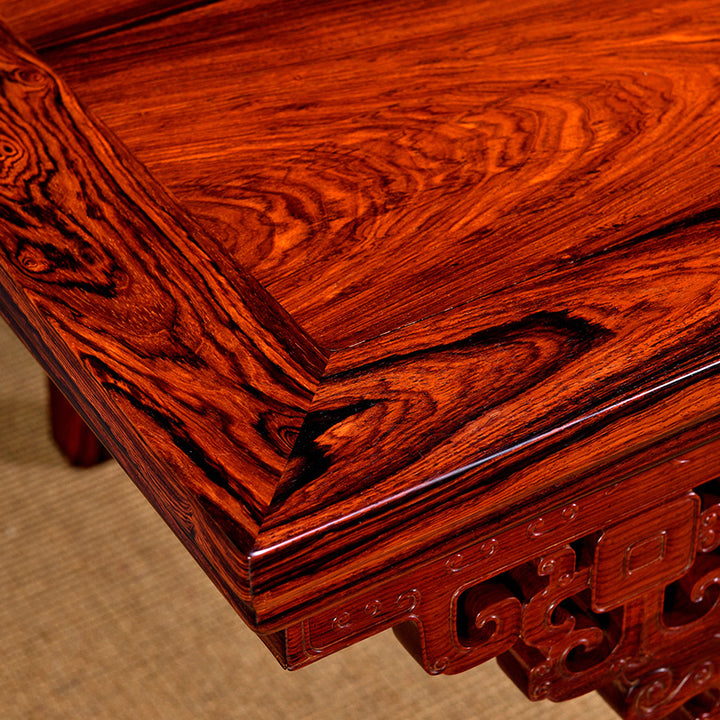 Luxurious Granadillo wood table with detailed Chilong carvings