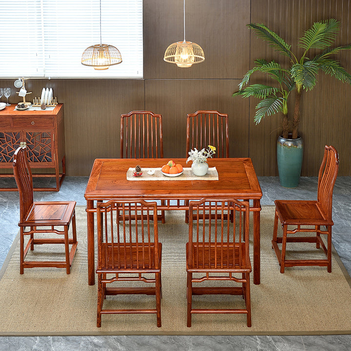 Beautiful Pterocarpus macrocarpus dining set featuring a table and six chairs.