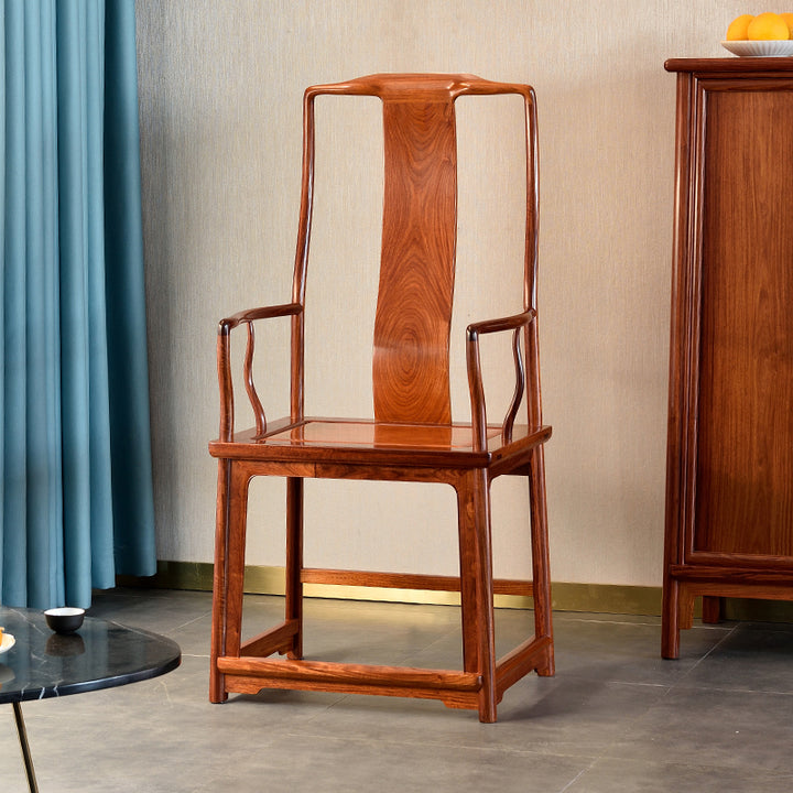 Pterocarpus wood chair with intricate armrest design