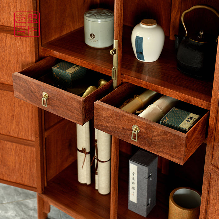 Traditional Pterocarpus Macrocarpus cabinet with elegant begonia carvings.