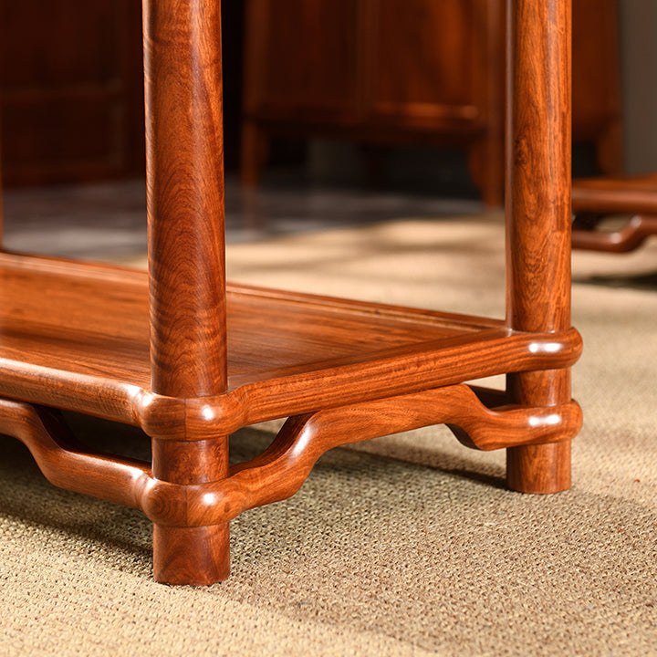 Classic Pterocarpus macrocarpus desk with elegant shelving.