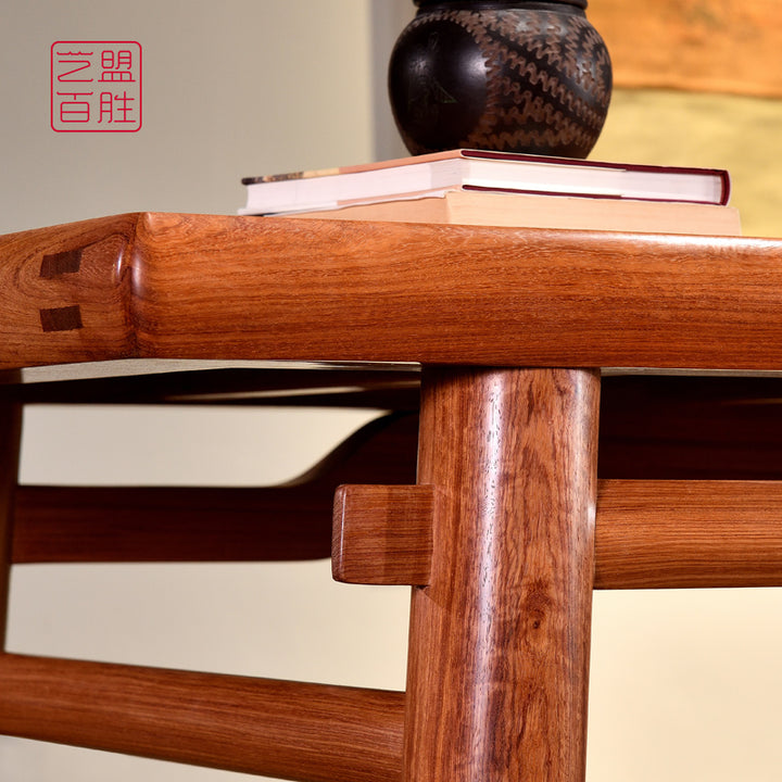 Pterocarpus macrocarpus wood table with elegant horizontal bar