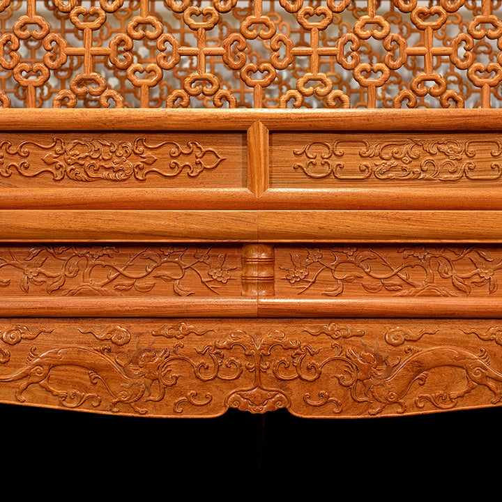 Hand-carved Pterocarpus macrocarpus moon gate bed featuring begonia motifs.