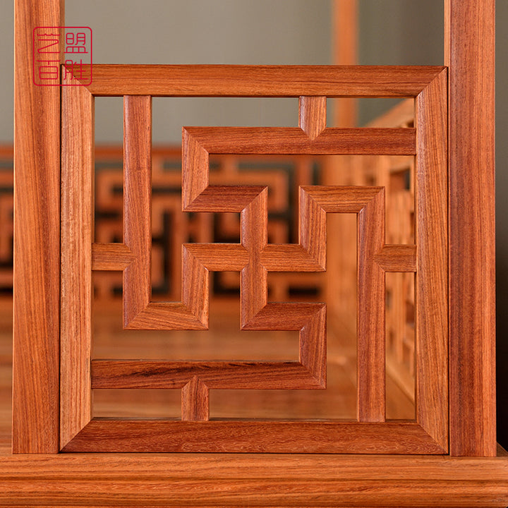 Ornate wooden bed with detailed carvings and Wan pattern lattice.