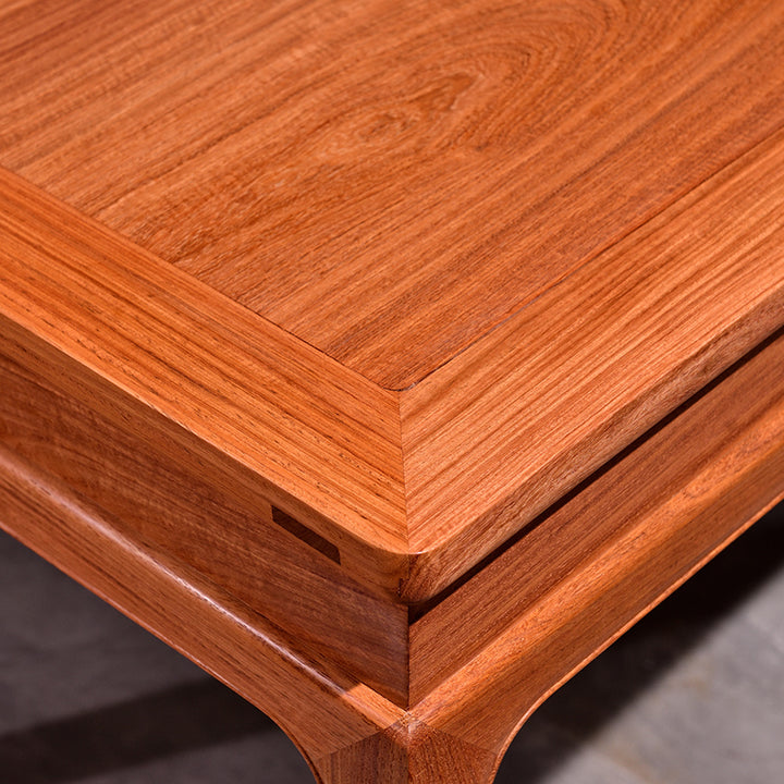 Pterocarpus Macrocarpus six-drawer desk in a sophisticated interior.