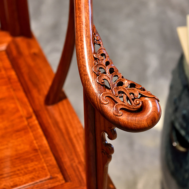 Pterocarpus macrocarpus armchairs with ornate scroll carvings and tea table