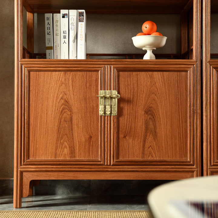 Side-by-side Pterocarpus macrocarpus bookshelves with ornamental melon-shaped legs