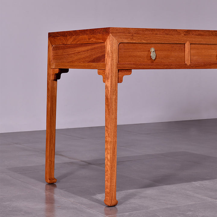 Pterocarpus macrocarpus wood desk with three spacious drawers.