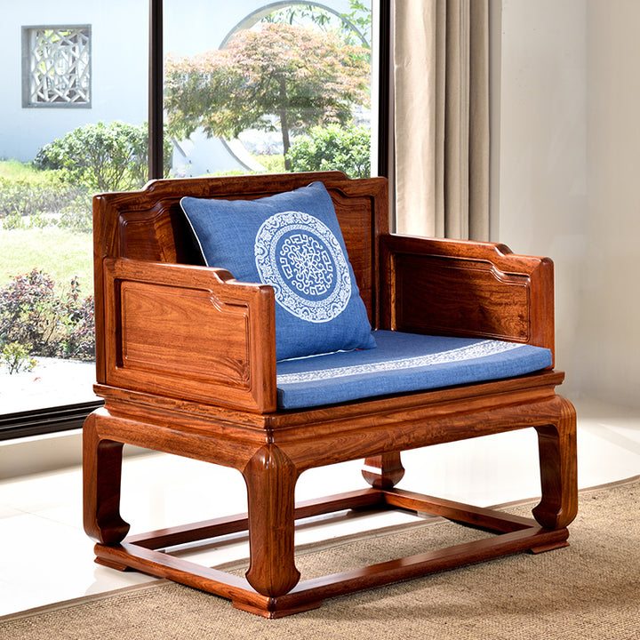 Luxurious rosewood sofa set with blue cushions and a matching coffee table.