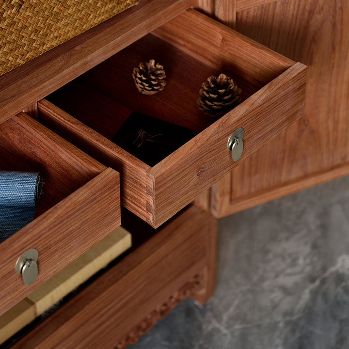 Elegant Pterocarpus cabinet featuring dragon carvings.