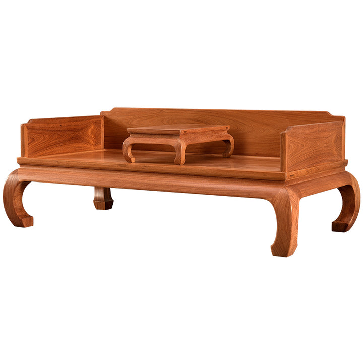 Side view of a Pterocarpus Macrocarpus daybed with curved legs